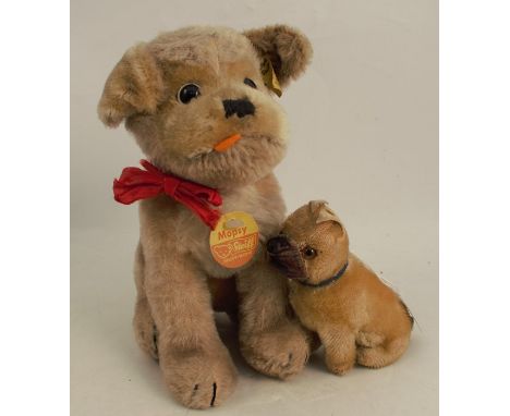 A Steiff dog, Mopsy, together with a plush toy boxer dog, possibly Steiff