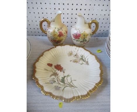 A collection of Royal Worcester blush ivory, to include a plate and two flat back jug&nbsp;