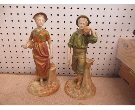 A pair of Royal Worcester figures, a young man with an axe and a woman with a bucket, height 7ins