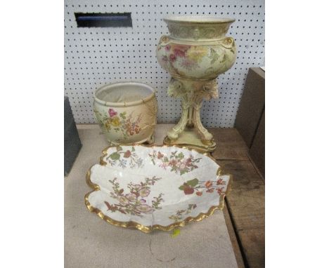 A Royal Worcester blush ivory vase, decorated with flowers and rams' heads and hoof feet, together with a blush ivory jardini