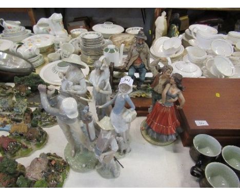 A collection of Lladro and Cappo de Monte models