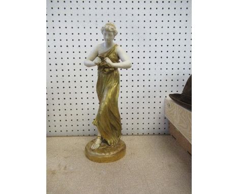 A Royal Worcester figure, a young woman holding a posy of flowers wearing classical dress, signed Hadley, af, height 13ins