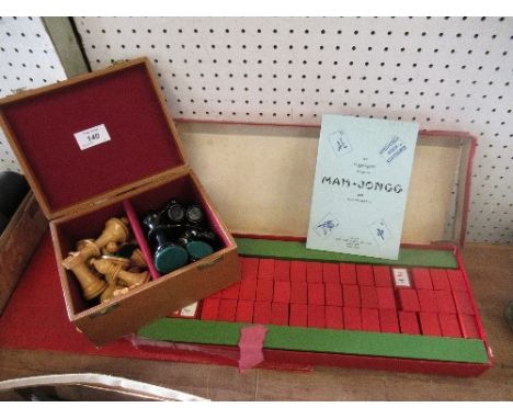 A Chad Valley boxed mah-jong set, and a turned wooden chess set, in box and board