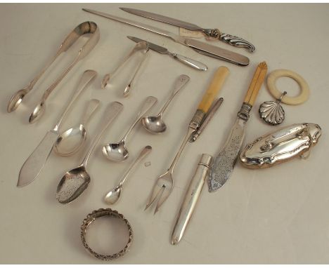 A collection of flatware, to include mainly hallmarked silver, sugar tongs, butter knife, spoons, caddy spoon, etc, together 