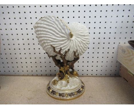 A Royal Worcester nautilus shell vase, in natural colour, height 8.5ins