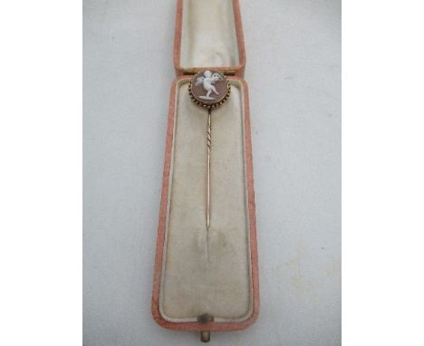 A 19th century gold and cameo cupid stick pin, cased