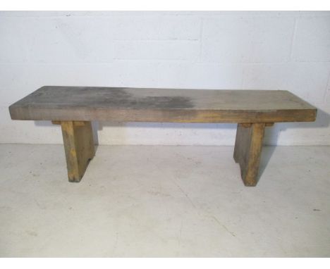 A rustic wooden bench. 121cm x 32cm height 37cm