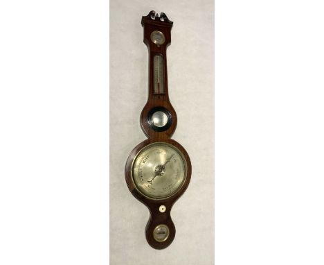 A Georgian banjo barometer, by O. Poppi of Holborn. 