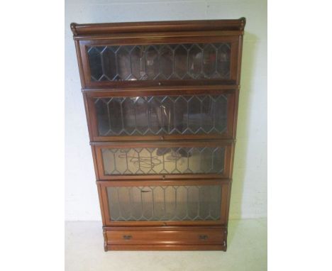 A Globe Wernicke bookcase with leaded light detailing