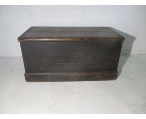 A stained pine trunk. 85cm x 44cm, height 44cm 