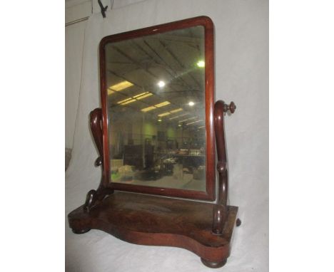  A Victorian Serpentine fronted toilet mirror. Height 71cm, width 60cm.