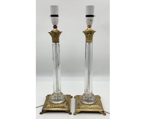 A pair of art deco style modern lamps with gilt decoration