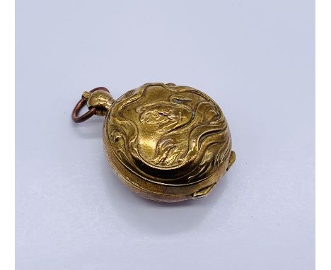 A brass Art Nouveau sovereign case depicting a swan