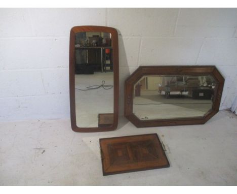 An oak framed mirror, a mid century mirror, plus a tray.