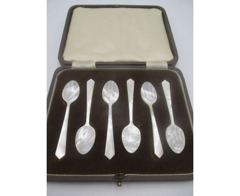 A cased set of mother of pearl coffee spoons