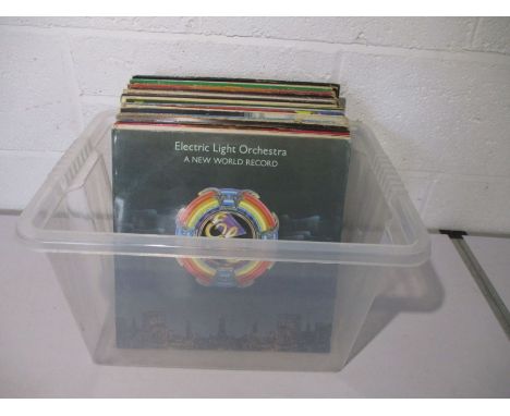 A collection of 12" vinyl records including ELO, Abba, Billy Joel, The Beach Boys, Rod Stewart, Wishbone Ash, Wings, Cat Stev