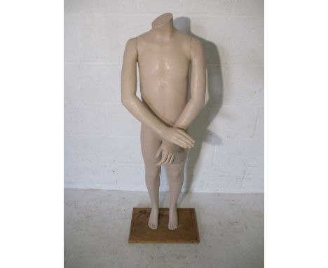 A child's shop display mannequin
