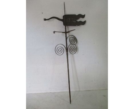 A wrought iron weather vane, dated 1732. A/F