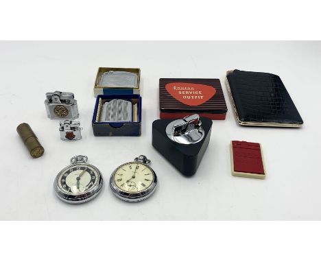 Two pocket watches by Ingersoll along with a small collection of lighters including The Rolls Wonder Lighter, Ronson, and a b