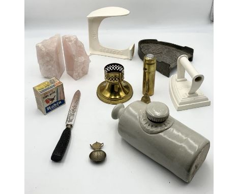 A collection of assorted items including quartz bookends, Masons lamp base, stoneware hot water bottle etc