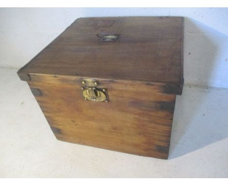 A vintage wooden trunk with French label to top