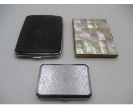 A mother of pearl cigarette case along with two others