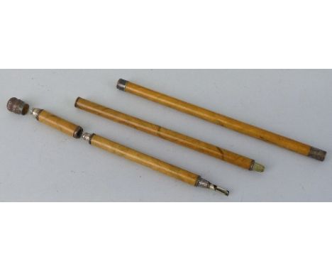 A malacca cane novelty swagger stick/travelling writing set, composed of four threaded sections, the removable embossed coppe