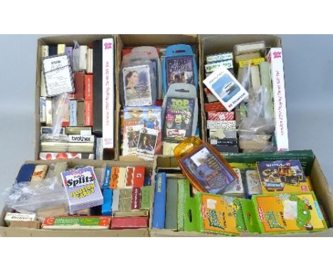 Five boxes of playing cards and playing card games, approximately one hundred and fifty packs including 2012 Olympic Games, T