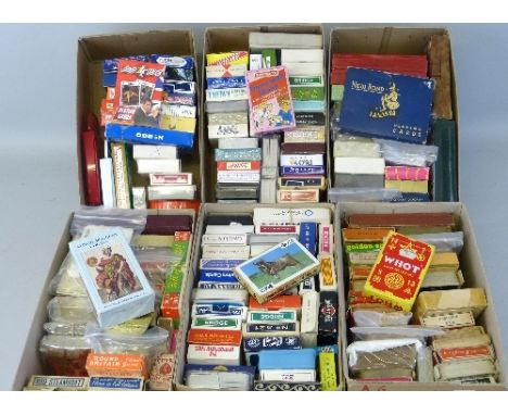Six boxes of playing cards and playing card games, approximately one hundred and seventy packs including promotional, adverti