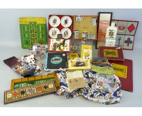 Miscellaneous playing card related items, including cribbage score boards, opaque glass cuboid decanter, set of suite symbol 