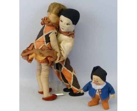 A Chad Valley Hygenic doll of Snow White's dwarf "Happy", 15.5cm high and a pair of Deans Rag Book conjoined dolls of "Pierro