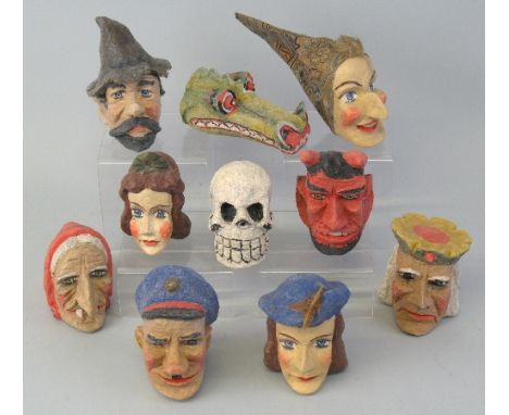 Ten composition puppet heads, including crocodile, devil, skeleton, Judy, King, etc, average size 9cm high (10)