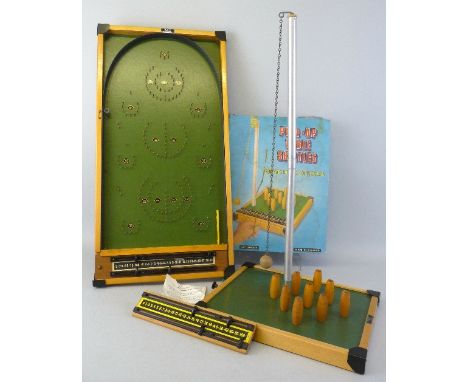 Kay of London table top bagatelle board, 77cm x 39cm, boxed, together with a Kay of London "pull-up table skittles" game, box