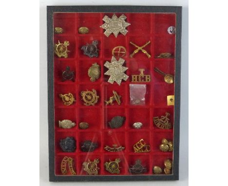 A collection of badges and buttons predominantly relating to Cycle Corps including Army Cyclists Corps, County of London Cycl