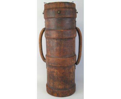 A WW1 moulded leather artillery shell carrier with three reinforced bands, twin carrying handles, canvas lining, marked "N" a