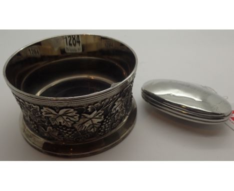 Presumed low grade silver oyster snuff box with inscription, rubbed and a silver plated wine coaster, no marks present