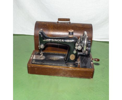 A table top Singer Sewing machine