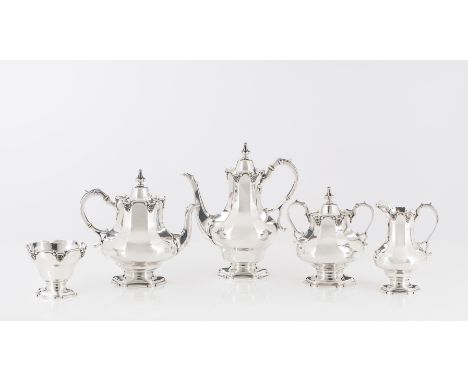 A tea and coffee serviceComprising: a teapot; coffee pot; milk jug; sugar bowl and bowlSilver, fineness .916Lisbon hallmark (