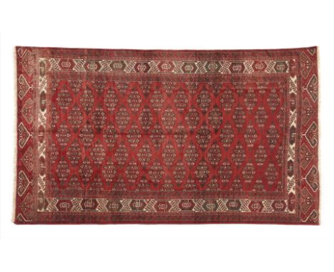 Bukhara carpet, IranWool and cotton, featuring a geometric design in shades of burgundy and beige320Ã—200 cm