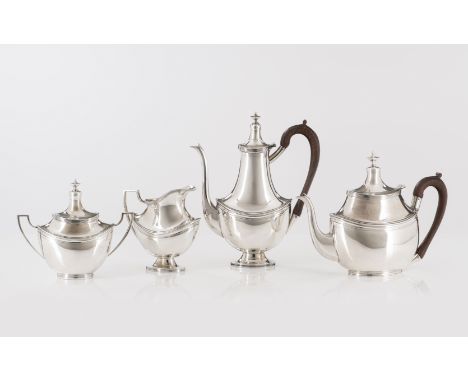 A Neoclassical tea and coffee serviceComprising: a teapot, coffee pot, milk jug and sugar bowlSilver, fineness .833Plain poli