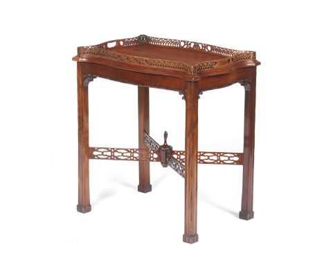 A Chippendale style side tableMahogany_x000D_Scalloped removable top with gallery_x000D_Legs joined at centre by cut-out stre