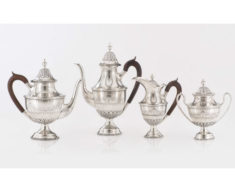 A tea and coffee serviceComprising: a teapot, coffee pot, covered sugar bowl and covered milk jugSilver, fineness .833Neoclas