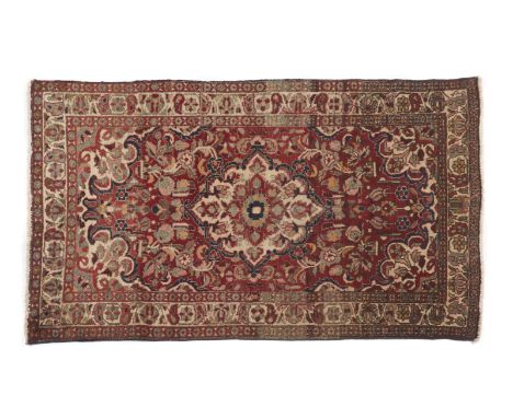 Hamedan carpet, IranWool and cotton, featuring a floral design in shades of beige, salmon, and blue150Ã—100 cm