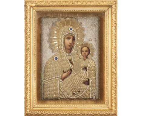 Our Lady of Kazan Russian icon in tempera on wood, with riza embroidered in gilt metal threads, pearls and coloured cabochons