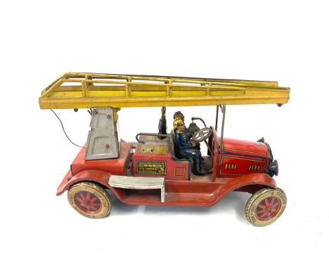 Vintage tin mechanical fire engine toy with key, untested 