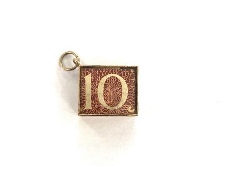 Vintage 9ct ten shilling note charm, approximate weight 2.4g 