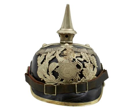 the black skull with white metal mounts to include state helmet plate, scroll banner, fluted spike finial with quatrefoil bas