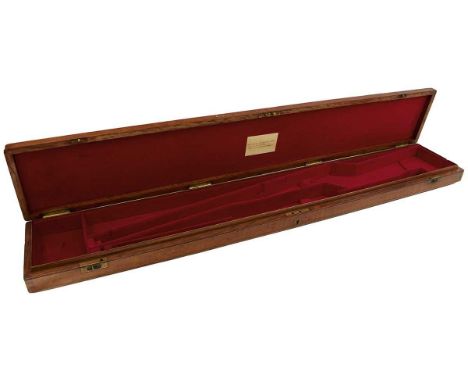 the oak case with red felt lined interior, the lid with maker's trade label for The Wilkinson Sword Company, 46inches x 6.25i