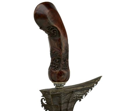 36.5cm striped wavy pamor blade, characteristic shaped wooden hilt decorated with scrolling foliage and grotesque masks, cont