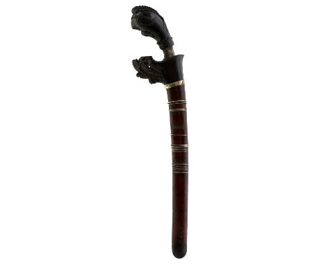 21cm curved fullered watered steel blade, characteristic carved wooden hilt, contained in its horn mounted polished wood shea
